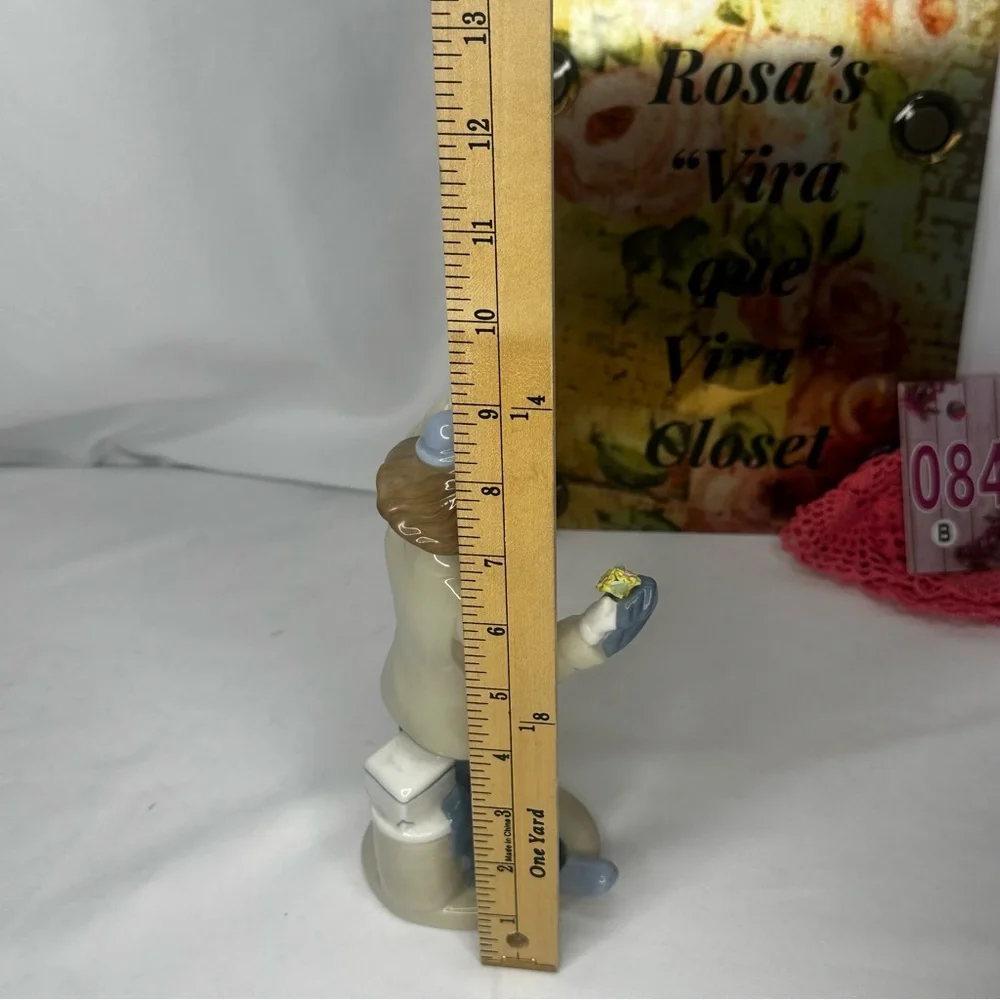 Vintage Paul Sabastian Porcelain Clown Figurine with Flower